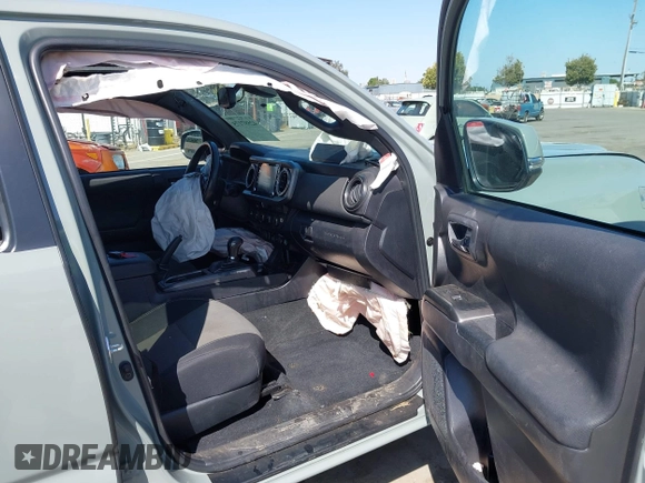 2022 Toyota Tacoma SR with VIN 3TMCZ5AN0NM489420, listed as a IAAI auction lot 42597175 with 129,340 mi miles and . Bid and sale history available at DreamBid. Image 5.