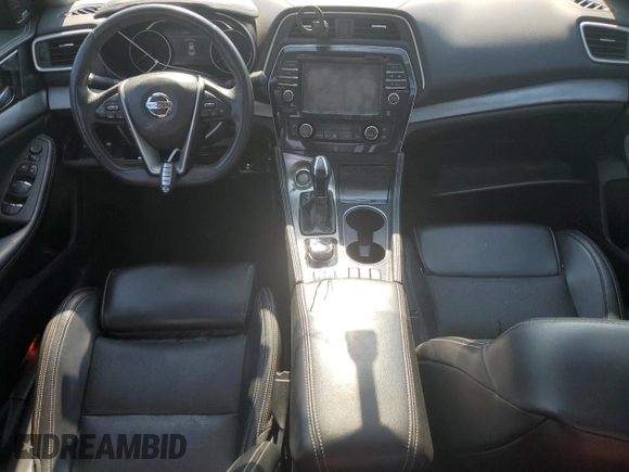 2017 Nissan Maxima SL with VIN 1N4AA6AP4HC424958, listed as a Copart auction lot 57298725 with 127,485 mi miles and Salvage title. Bid and sale history available at DreamBid. Image 8.