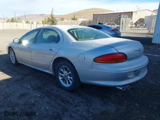 2000 Chrysler LHS with VIN 2C3HC56G0YH390573, listed as a IAAI auction lot 41146903 with 207,371 mi miles. Bid and sale history available at carsss.com. Image 3.