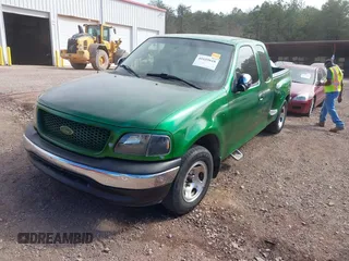 2001 Ford F-150 XL with VIN 2FTRX07WX1CA79197, listed as a IAAI auction lot 41655618 with 267,846 mi miles. Bid and sale history available at carsss.com. Image 2.