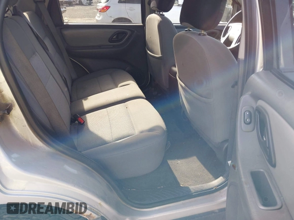 2006 Ford Escape XLT with VIN 1FMYU93126KC36402, listed as a IAAI auction lot 42122882 with 192,899 mi miles and . Bid and sale history available at DreamBid. Image 8.