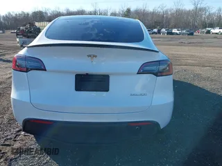 2022 Tesla Model Y Performance with VIN 7SAYGDEF5NF542189, listed as a IAAI auction lot 41643254 with 18,865 mi miles and . Bid and sale history available at DreamBid. Image 15.