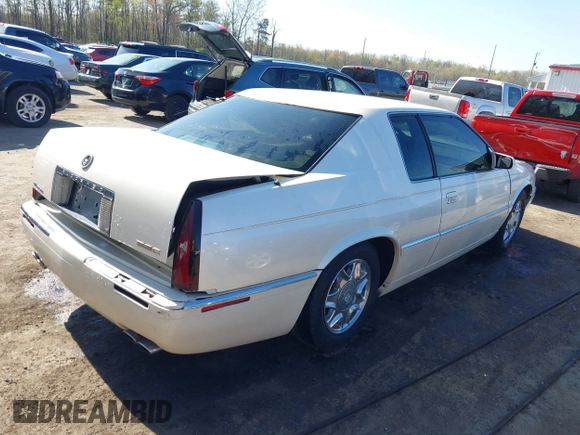 2000 Cadillac Eldorado ESC with VIN 1G6EL12Y0YB702778, listed as a IAAI auction lot 41988107 with 203,526 mi miles. Bid and sale history available at carsss.com. Image 4.