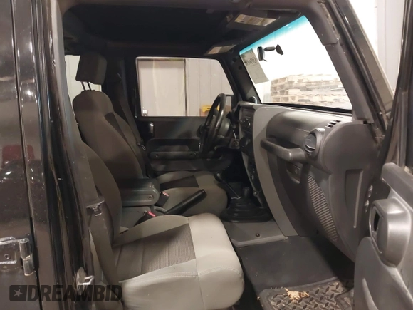 2008 Jeep Wrangler Unlimited X with VIN 1J4GA391X8L558984, listed as a IAAI auction lot 41016498 with 123,308 mi miles. Bid and sale history available at carsss.com. Image 5.