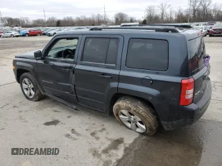 2014 Jeep Patriot Sport with VIN 1C4NJRBB6ED520841, listed as a Copart auction lot 48103545 with 136,012 mi miles and Salvage Title. Bid and sale history available at DreamBid. Image 2.