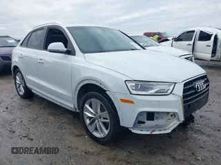 2018 Audi Q3 Premium with VIN WA1BCCFS8JR001625, listed as a IAAI auction lot 41238896 with 127,681 mi miles. Bid and sale history available at carsss.com. Image 1.