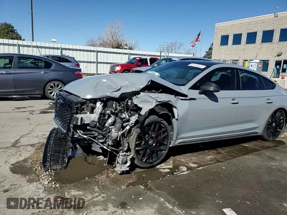 2019 Audi RS 5 Sportback z VIN WUABWCF52KA903181, wystawiony jako Copart lot #46123525 z przebiegiem 32 366 mil mil oraz Szkody całkowita. Historia ofert i sprzedaży dostępna na DreamBid. Obrazek 13.