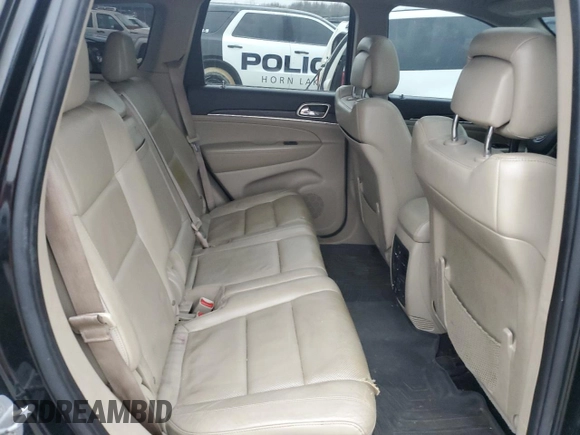2014 Jeep Grand Cherokee Limited with VIN 1C4RJEBT5EC213332, listed as a Copart auction lot 87583515 with 152,409 mi miles and Salvage Title. Bid and sale history available at DreamBid. Image 11.
