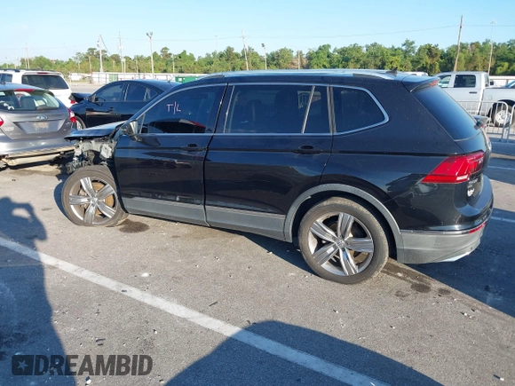 2018 Volkswagen Tiguan SEL Premium with VIN 3VV5B7AX1JM002585, listed as a IAAI auction lot 40495823 with 82,376 mi miles and . Bid and sale history available at DreamBid. Image 3.