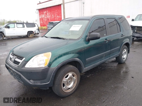 2004 Honda CR-V LX with VIN JHLRD78404C028934, listed as a IAAI auction lot 42023397 with 216,304 mi miles and . Bid and sale history available at carsss.com. Image 2.