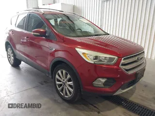2017 Ford Escape Titanium with VIN 1FMCU9J91HUA32264, listed as a IAAI auction lot 42050273 with 201,128 mi miles. Bid and sale history available at carsss.com. Image 1.