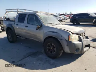 2002 Nissan Frontier SE with VIN 1N6ED27T52C383700, listed as a Copart auction lot 86204074 with 216,908 mi miles and Salvage title. Bid and sale history available at DreamBid. Image 4.