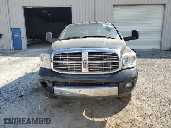 2008 Dodge 3500 Laramie z VIN 3D3MX49A98G105344, wystawiony jako Copart lot #74003044 z przebiegiem 183 844 mil mil oraz Szkoda całkowita • Salvage title. Historia ofert i sprzedaży dostępna na DreamBid. Obrazek 5.