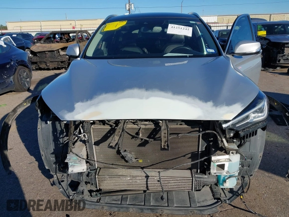 2020 Infiniti QX50 Luxe z VIN 3PCAJ5M37LF105904, wystawiony jako IAAI lot #41251242 z przebiegiem 66 806 mil mil oraz . Historia ofert i sprzedaży dostępna na DreamBid. Obrazek 6.