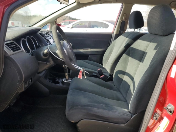 2010 Nissan Versa 1.8 S with VIN 3N1BC1AP2AL433022, listed as a Copart auction lot 86114384 with 180,689 mi miles and Salvage Title. Bid and sale history available at carsss.com. Image 7.