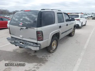 2005 Chevrolet Tahoe LS z VIN 1GNEK13T15J125805, wystawiony jako IAAI lot #41490443 z przebiegiem Nie podano mil oraz . Historia ofert i sprzedaży dostępna na DreamBid. Obrazek 4.