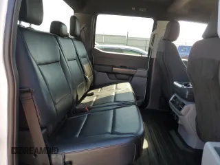 2023 Ford F-150 Lightning Pro with VIN 1FT6W1EVXPWG44972, listed as a Copart auction lot 60303485 with 19,788 mi miles and Salvage title. Bid and sale history available at DreamBid. Image 10.