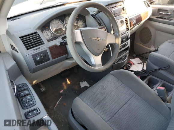 2010 Chrysler Town & Country LX with VIN 2A4RR4DE3AR344191, listed as a Copart auction lot 41399625 with 163,934 mi miles and Salvage Title. Bid and sale history available at DreamBid. Image 8.