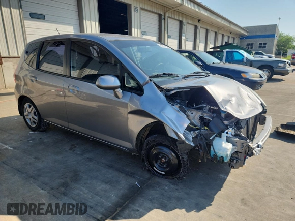 2007 Honda Fit with VIN JHMGD38407S066833, listed as a Copart auction lot 61713125 with 62,917 mi miles and Salvage title. Bid and sale history available at DreamBid. Image 4.