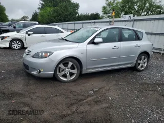 2006 Mazda 3 S Grand Touring z VIN JM1BK343X61539432, wystawiony jako Copart lot #57051105 z przebiegiem 181 009 mil mil oraz Szkoda całkowita • Salvage title. Historia ofert i sprzedaży dostępna na DreamBid. Obrazek 1.