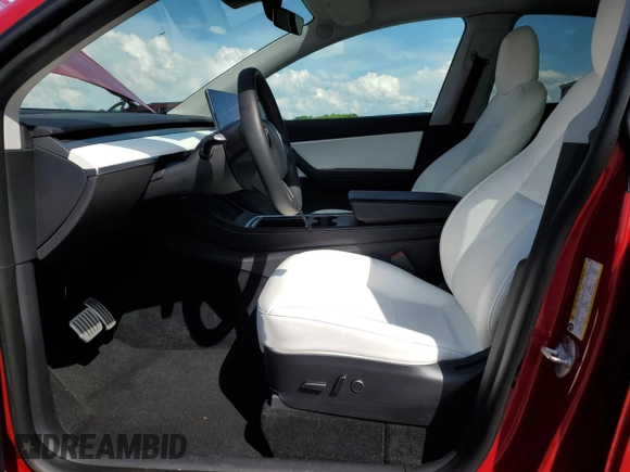 2022 Tesla Model Y Performance with VIN 7SAYGDEF6NF337996, listed as a Copart auction lot 56039515 with 16,468 mi miles and Salvage title. Bid and sale history available at DreamBid. Image 14.