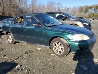 1999 Honda Civic VP with VIN 2HGEJ6616XH584532, listed as a Copart auction lot 86696594 with 232,724 mi miles and Salvage Title. Bid and sale history available at carsss.com. Image 4.
