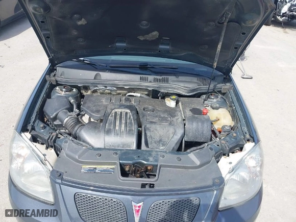 2009 Pontiac G5 with VIN 1G2AS18H897149649, listed as a IAAI auction lot 41917410 with 113,565 mi miles. Bid and sale history available at carsss.com. Image 10.