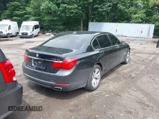 2015 BMW 7 Series 740Li xDrive with VIN WBAYF4C55FG291723, listed as a IAAI auction lot 42694382 with 101,140 mi miles and . Bid and sale history available at DreamBid. Image 4.