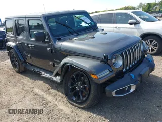 2023 Jeep Wrangler Sahara z VIN 1C4JJXP69PW684803, wystawiony jako IAAI lot #42214320 z przebiegiem 37 723 mil mil oraz . Historia ofert i sprzedaży dostępna na DreamBid. Obrazek 1.