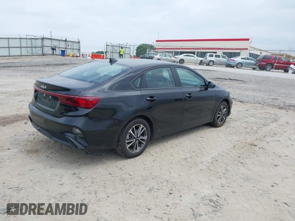 2023 Kia Forte LXS with VIN 3KPF24AD1PE594919, listed as a IAAI auction lot 42158476 with 34,719 mi miles and . Bid and sale history available at DreamBid. Image 4.