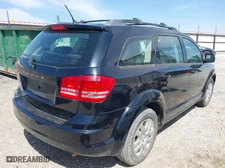 2015 Dodge Journey American Value Pkg with VIN 3C4PDCAB6FT700458, listed as a IAAI auction lot 41814859 with 131,870 mi miles. Bid and sale history available at carsss.com. Image 4.