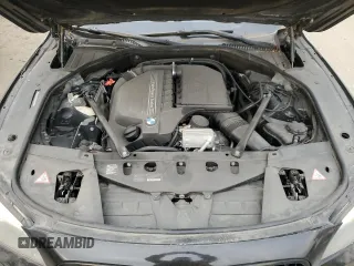 2015 BMW 7 Series 740Li with VIN WBAYE4C50FD947217, listed as a Copart auction lot 87899785 with Not provided miles and Salvage title. Bid and sale history available at DreamBid. Image 11.