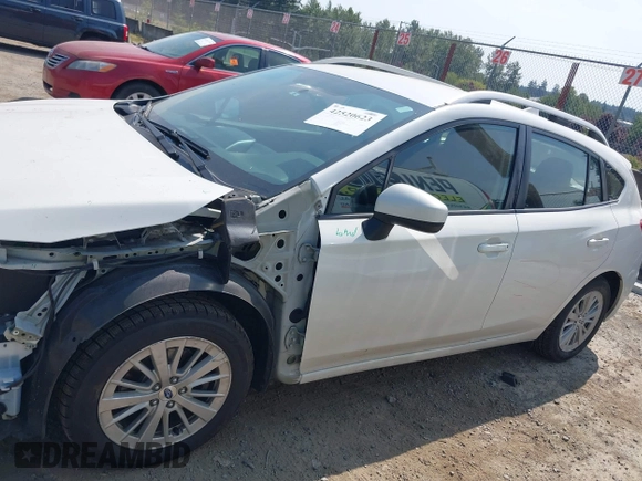 2017 Subaru Impreza Premium z VIN 4S3GTAB61H3718731, wystawiony jako IAAI lot #42520623 z przebiegiem 86 225 mil mil oraz . Historia ofert i sprzedaży dostępna na DreamBid. Obrazek 14.