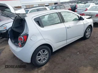 2014 Chevrolet Sonic LT with VIN 1G1JC6SGXE4227987, listed as a IAAI auction lot 41664049 with 1 mi miles. Bid and sale history available at carsss.com. Image 4.