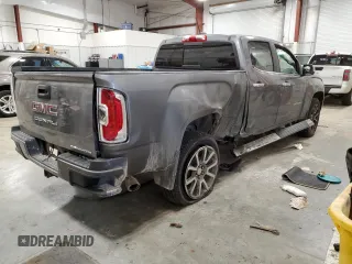 2021 GMC Canyon 4WD Denali with VIN 1GTG6EEN3M1129459, listed as a Copart auction lot 87618305 with 37,663 mi miles and Salvage Title. Bid and sale history available at carsss.com. Image 3.