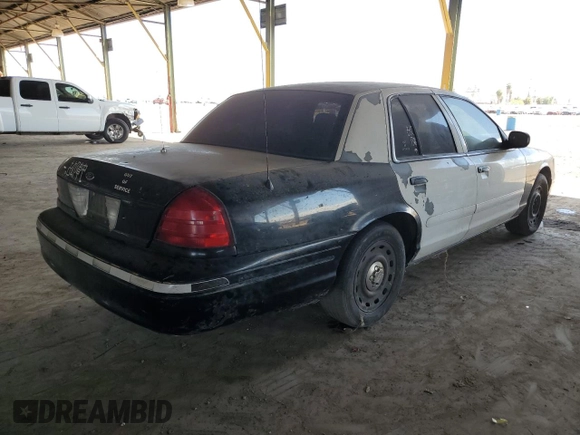 2005 Ford Police Interceptor with VIN 2FAFP71W85X121486, listed as a Copart auction lot 52652485 with 226,020 mi miles and Clean title. Bid and sale history available at DreamBid. Image 3.