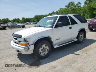 2002 Chevrolet Blazer LS z VIN 1GNCT18W92K222330, wystawiony jako Copart lot #59230195 z przebiegiem Nie podano mil oraz Szkoda całkowita • Salvage title. Historia ofert i sprzedaży dostępna na DreamBid. Obrazek 1.