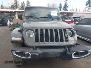 2021 Jeep Gladiator Willys with VIN 1C6HJTAG5ML616706, listed as a IAAI auction lot 41367142 with 50,951 mi miles and . Bid and sale history available at carsss.com. Image 12.