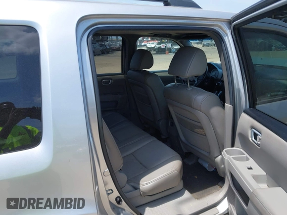 2011 Honda Pilot EX-L with VIN 5FNYF4H54BB099550, listed as a IAAI auction lot 42107327 with 217,050 mi miles and . Bid and sale history available at carsss.com. Image 8.