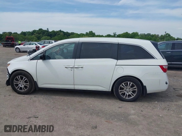 2012 Honda Odyssey EX-L with VIN 5FNRL5H62CB059481, listed as a IAAI auction lot 42241415 with 135,244 mi miles and . Bid and sale history available at DreamBid. Image 14.