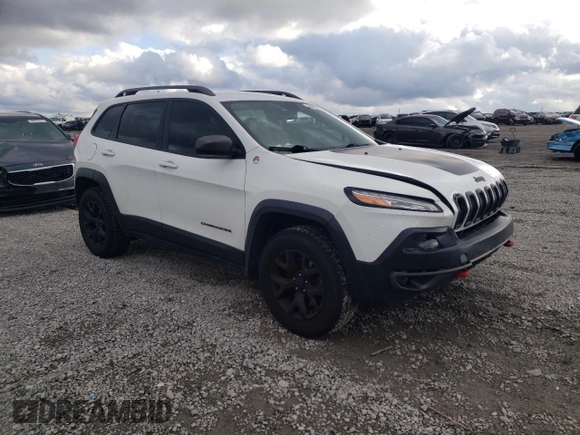 2017 Jeep Cherokee Trailhawk L Plus with VIN 1C4PJMBB7HW500120, listed as a Copart auction lot 84458794 with 157,311 mi miles and Salvage Title. Bid and sale history available at carsss.com. Image 4.