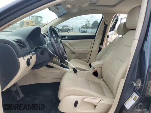 2010 Volkswagen Jetta Limited Edition with VIN 3VWRZ7AJ0AM099928, listed as a Copart auction lot 57291895 with 118,451 mi miles and Salvage title. Bid and sale history available at DreamBid. Image 7.