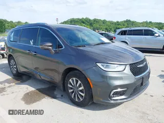 2021 Chrysler Pacifica Touring L with VIN 2C4RC1BG7MR519024, listed as a IAAI auction lot 42179211 with 86,457 mi miles and . Bid and sale history available at DreamBid. Image 1.