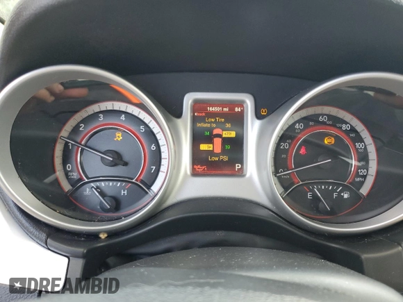 2014 Dodge Journey American Value with VIN 3C4PDCAB1ET135504, listed as a Copart auction lot 58803645 with 164,501 mi miles and Clean title. Bid and sale history available at DreamBid. Image 9.
