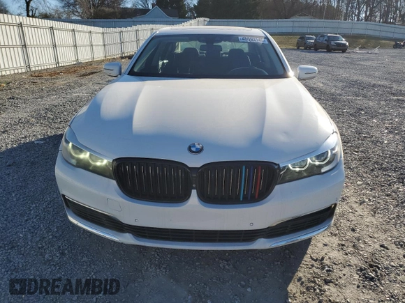 2017 BMW 7 Series 740i with VIN WBA7E2C32HG740649, listed as a Copart auction lot 45593145 with 122,793 mi miles and Salvage Title. Bid and sale history available at carsss.com. Image 5.