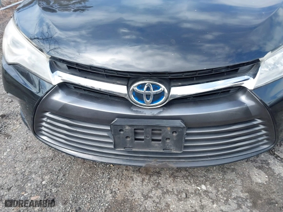 2015 Toyota Camry Hybrid LE with VIN 4T1BD1FK3FU164092, listed as a IAAI auction lot 41886726 with 396,189 mi miles. Bid and sale history available at carsss.com. Image 6.