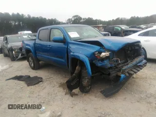 2018 Toyota Tacoma SR5 with VIN 3TMAZ5CN3JM066409, listed as a IAAI auction lot 41204775 with 75,000 mi miles and . Bid and sale history available at DreamBid. Image 1.