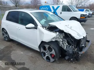 2012 Volkswagen GTI w/Sunroof & Navi PZEV z VIN WVWGD7AJ3CW229731, wystawiony jako IAAI lot #41875537 z przebiegiem 134 174 mil mil oraz . Historia ofert i sprzedaży dostępna na DreamBid. Obrazek 1.