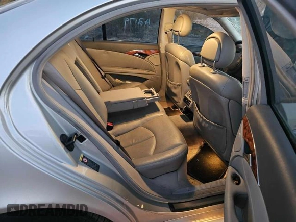 2003 Mercedes-Benz E-Class 5.0L with VIN WDBUF70J83A252853, listed as a Copart auction lot 77914304 with 181,702 mi miles and Clean Title. Bid and sale history available at carsss.com. Image 6.