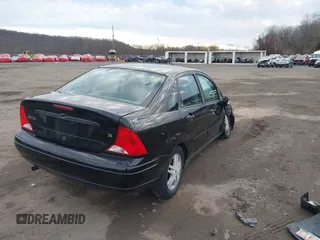 2000 Ford Focus SE with VIN 1FAFP34P7YW189078, listed as a IAAI auction lot 41222051 with 100,067 mi miles and . Bid and sale history available at carsss.com. Image 4.